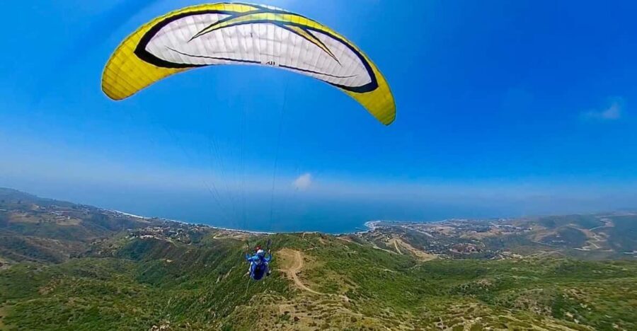 Malibu Hills to Beach: Tandem Paragliding Flight Adventure - Descent and landing on Malibu beach: learning the last steps